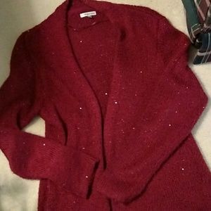 Sparkly red open front sweater or long cardigan.